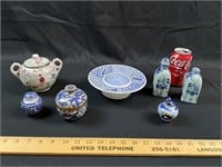 Lot of asian themed items shown