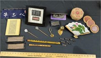 Lot of various Asian items shown