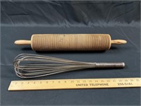 Large whisk and lefse rolling pin