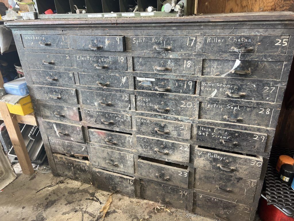 Wooden parts bin with contents