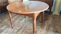 Vintage round table (on casters) 45" diameter