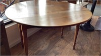 Loved round pine top table, lots of wear to top,