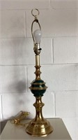Brass tone lamp,28 in tall with finial, works