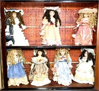 Seven Standing Porcelain Collectible Dolls