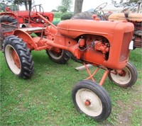 Allis-Chalmers B with a buz saw attachment wide