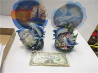 Two working dolphin light globes