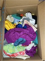 4 boxes of fabric scraps, thread, and patterns