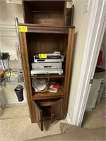 Wood entertainment center with 2 doors and 3 shelv
