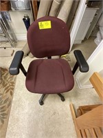 red fabric rolling secretary chair