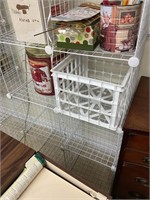 White metal storage rack with contents