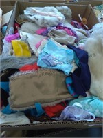 Large box of Barbie clothes