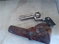 Vintage toy gun with leather holster