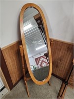 Oval mirror with wooden frame and stand