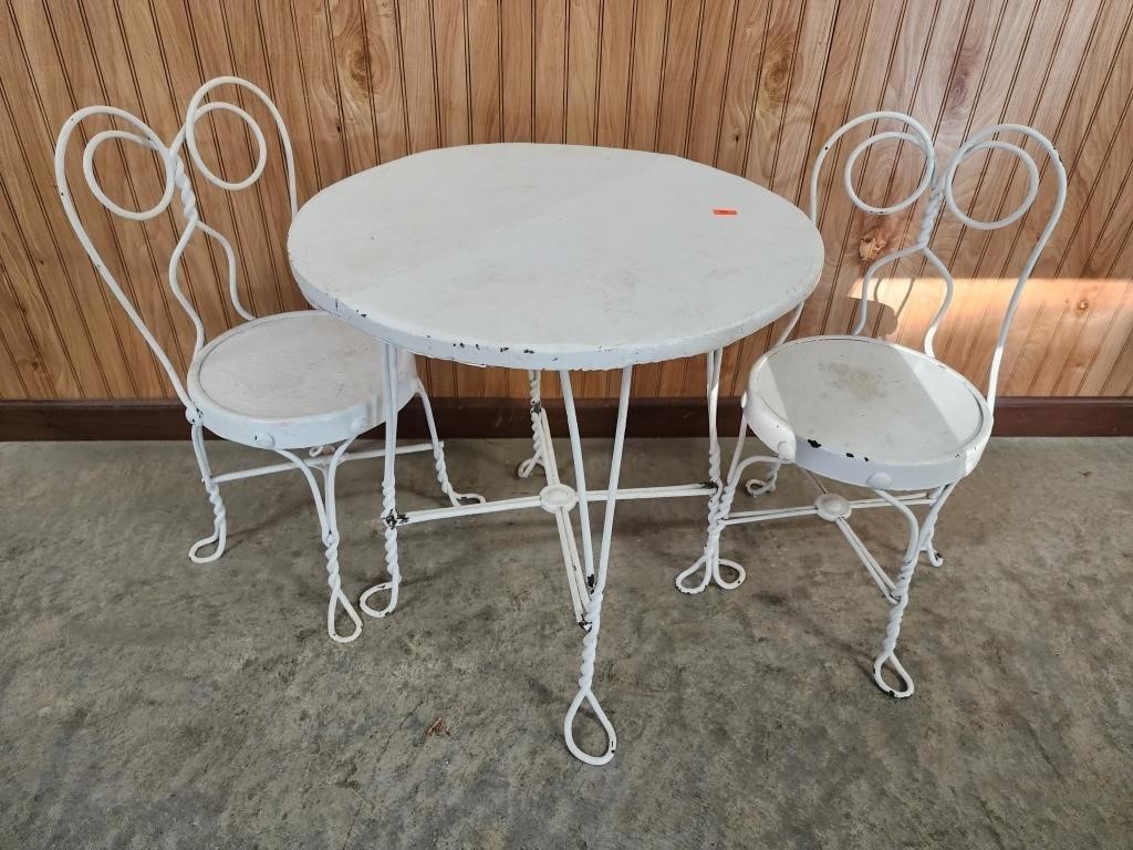 White wrought iron table and chairs set