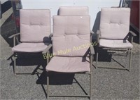 Four cushion folding lawn chairs