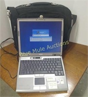 Dell laptop w/ case -turns on