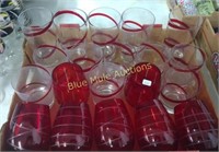 Assorted red drinking glasses