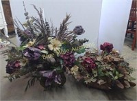 Artificial flowers in 2 tin containers