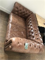 Distinctive Chesterfields tufted leather love seat