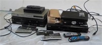 Variety of DVD players and electronic equipment.