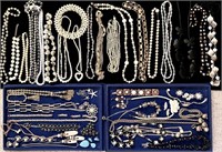 Large group of costume jewelry necklaces, etc.