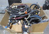 Tote full of hydraulic hoses