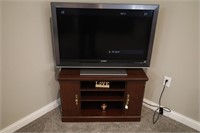 SONY 40" FLAT SCREEN TV WITH SAUDER TV STAND