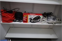 CONTENTS OF SHELF - POWER STRIPS, AUTO VACCUUM,