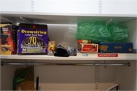 CONTENTS OF SHELF - TRASH BAGS, BOARD GAMES, FIRE