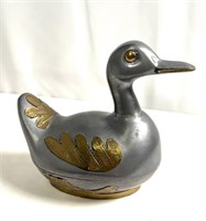 This is a Pewter handcrafted goose with inlay