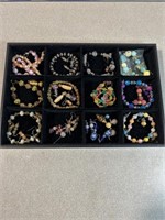 Costume jewelry including bracelets and earrings