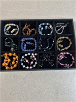 Costume jewelry, bracelets and earring sets