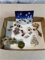 Christmas themed jewelry including earrings, pins