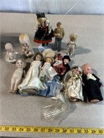 Vintage porcelain and plastic dolls, some marked