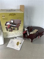 Magical musical maestro mouse with baby grand