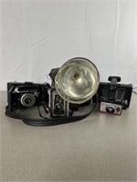 Vintage cameras, including Kodak Vigilant,