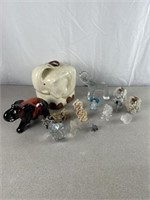 Elephant decorations, including glass, metal, and