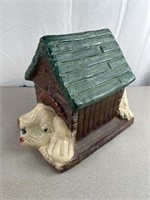 Ceramic doghouse. Approximately 14 inches long.