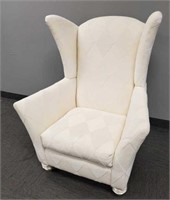 Designer style upholstered wingback chair -