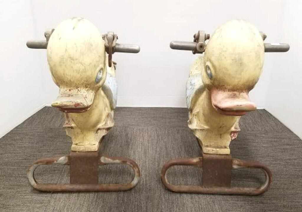 2 vintage cast metal playground duck swings