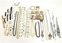 Group of costume jewelry including watches,