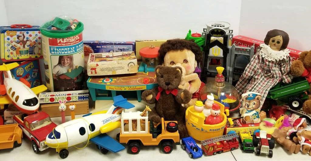 Group of toys including Fisher Price, Lincoln Logs