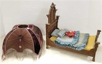 Victorian style doll bed with Victorian style lamp