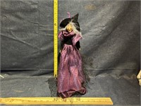 Witch on stand