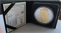 1.5 oz. Of silver Michael Jordan coin.  24k gold