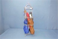 5 Compact Umbrellas In Toilet Paper Storage Stand