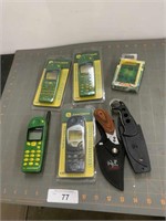 4 JD Nokia phone covers, 2 hunting knives, and