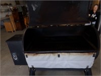 Treager Grill/smoker with cover and wood pellets