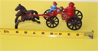 Vintage cast Iron Fireman Toy