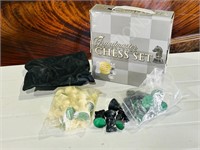 small glass chess set & set of plastic men